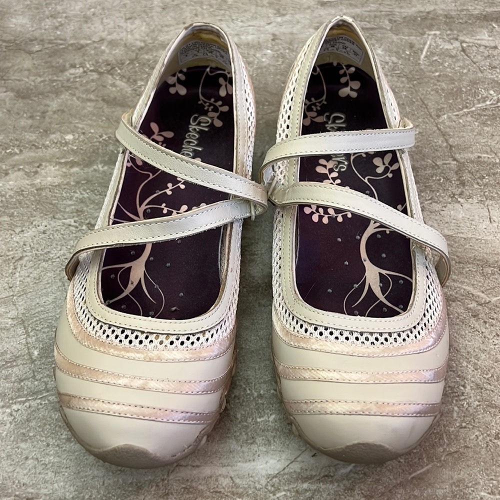 Sketchers cross strap flats. Fabric and mesh uppers, rubbery soles